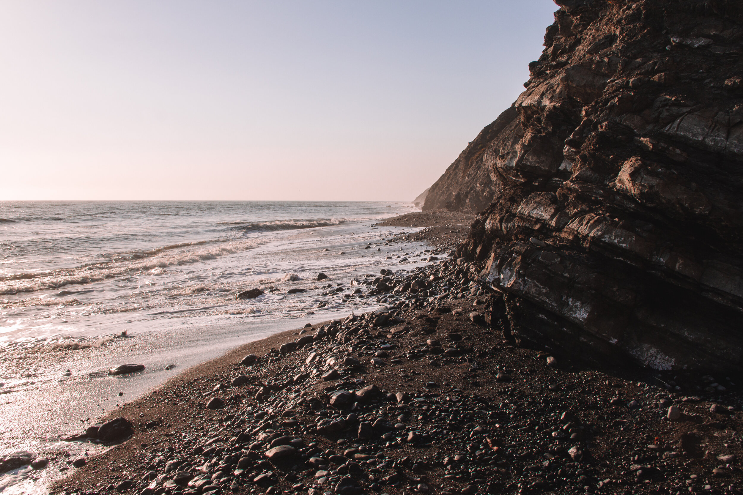 Black sand and rocks dominate the Lost Coast Trail