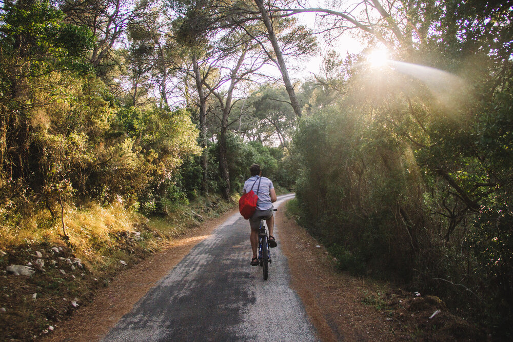 Biking along the salted lakes in Mljet National Park