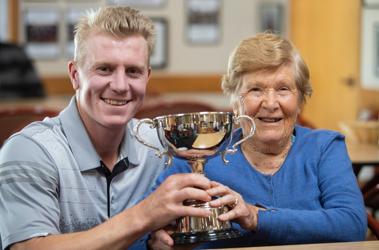 James Anstiss poses with his grandmonther after winning the Harewood Open in Christchurch