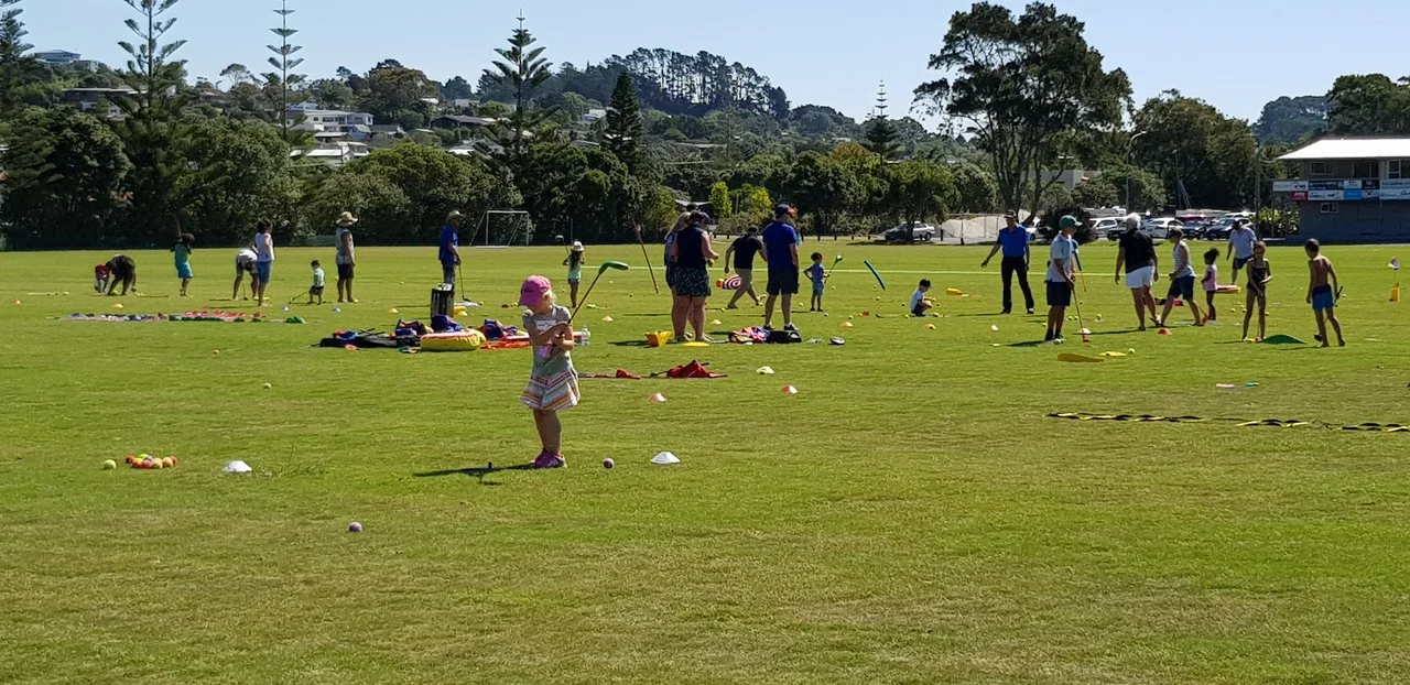 A recent golf in the park day with people of all ages having a go.
