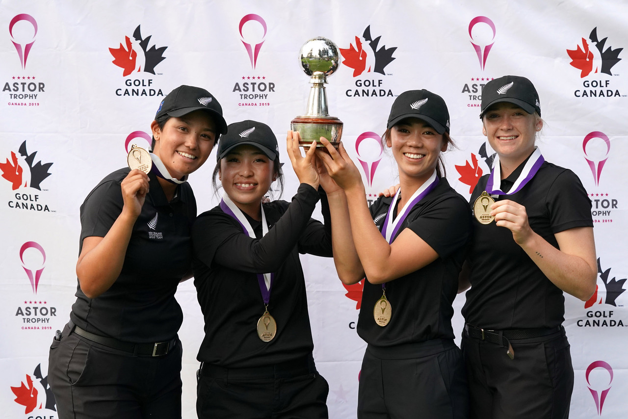 Julianne Alvarez, Carmen Lim, Wenyung Keh and Amelia Garvey pose with the Astor Trophy. Photo credit: Golf Canada.