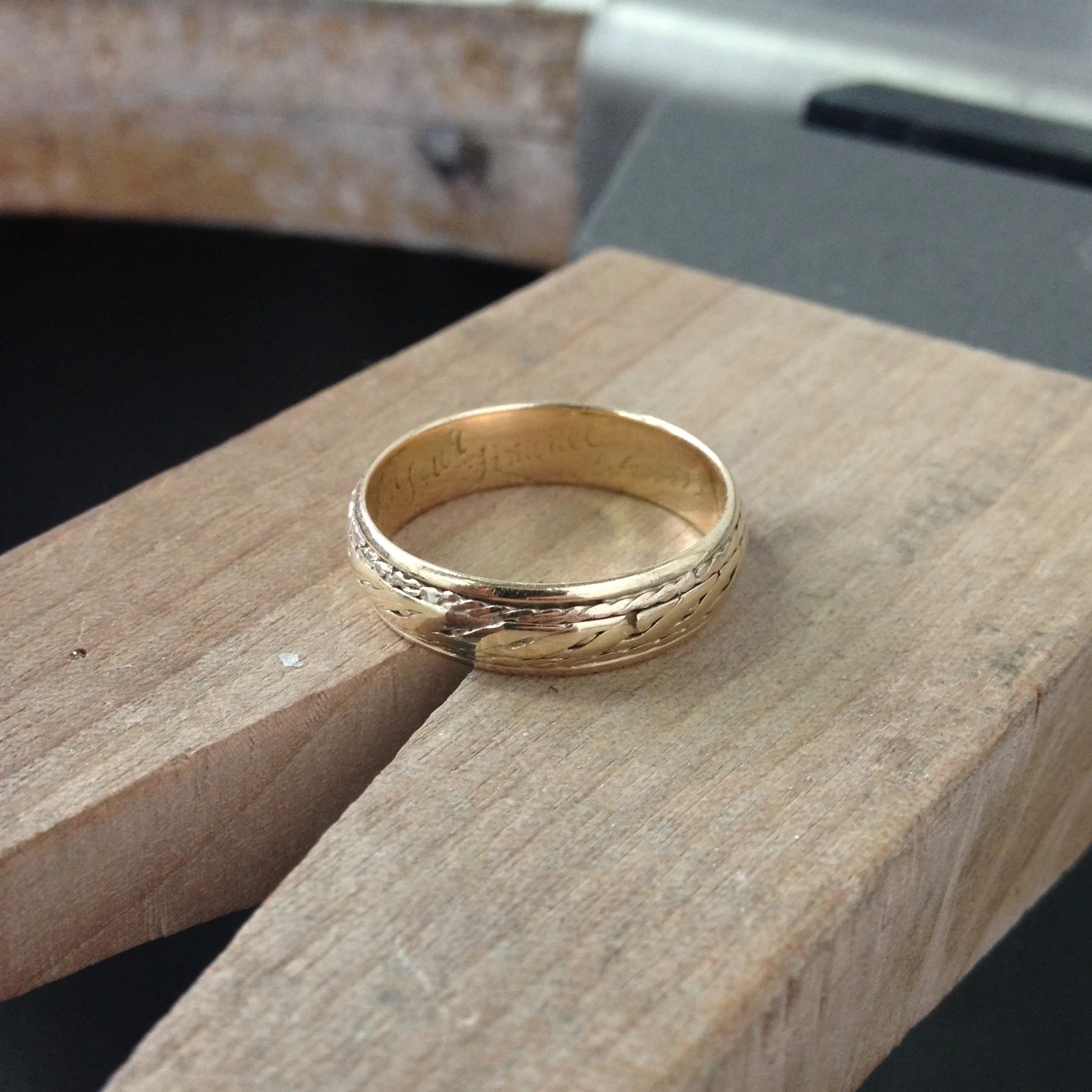 The original ring complete with engraving and sharp bit of gold 'rope' sticking out