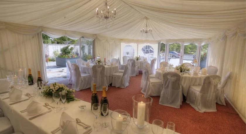 Chris Cook performing magic for Mothers Day