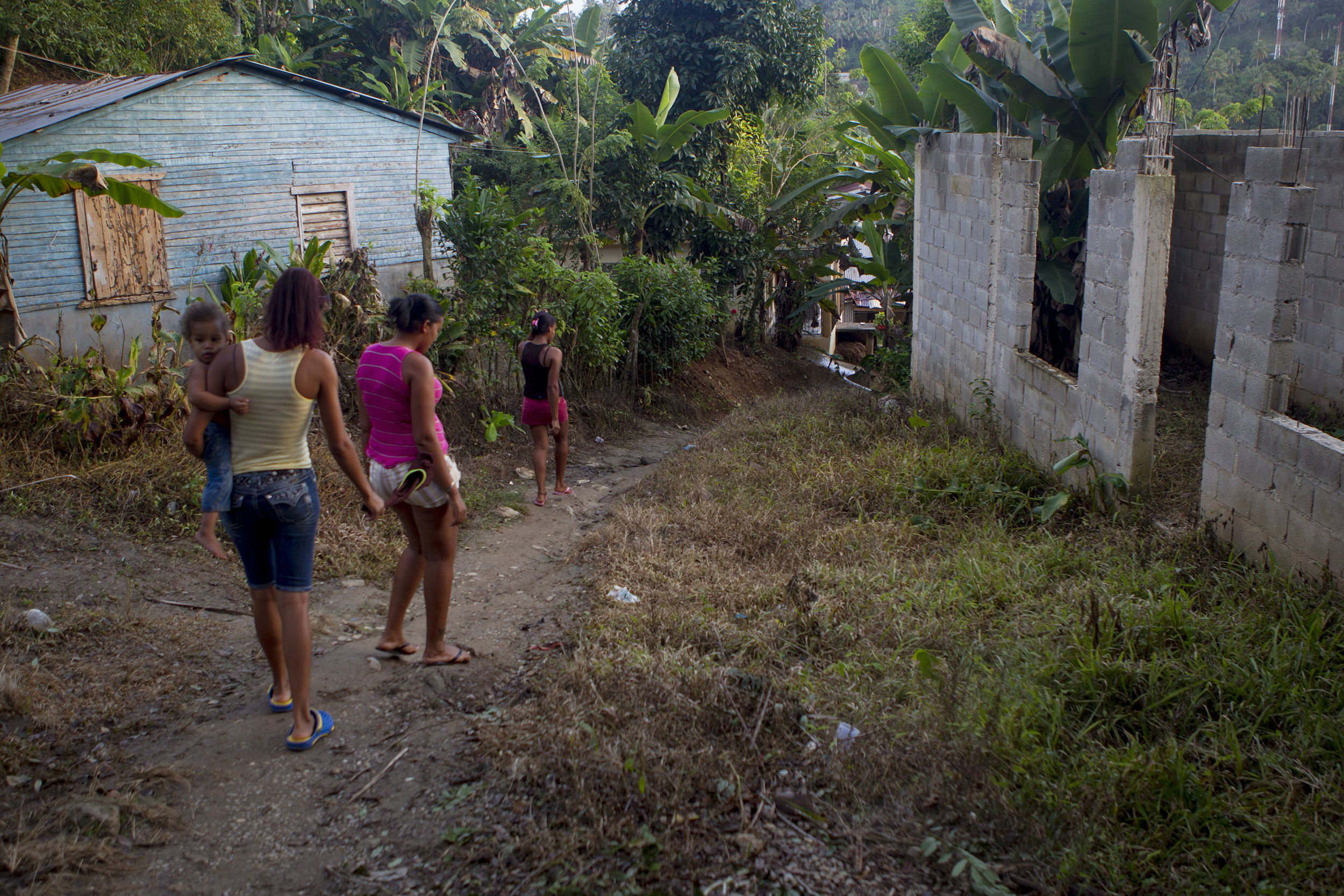 The girls head down into town from Berenise's house. 