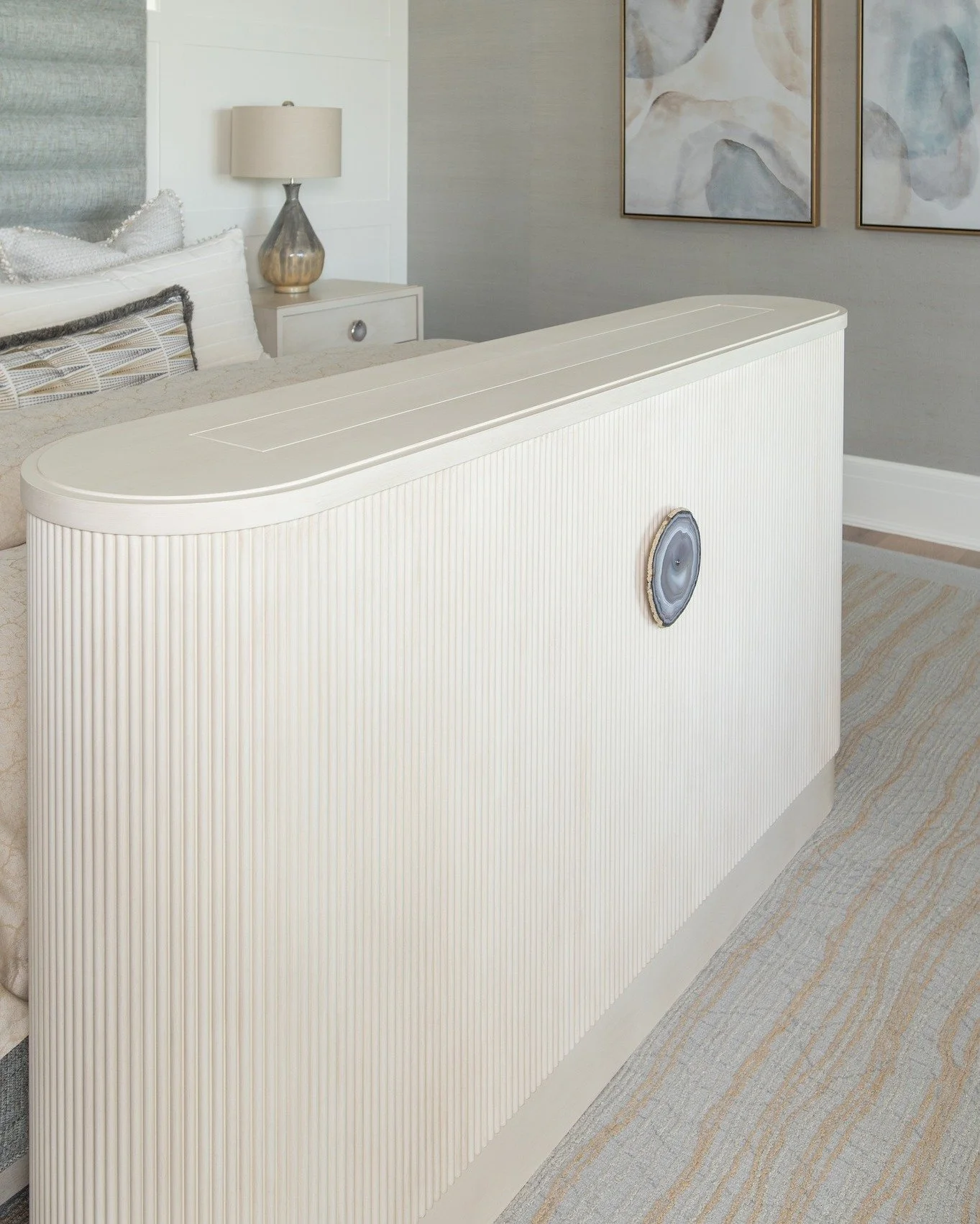 Style meets seamless function.

Imagine a beautifully crafted cabinet at the foot of your bed, thoughtfully designed to complement the space rather than compete with it. By day, your view takes center stage. Natural light pours in, uninterrupted, wit