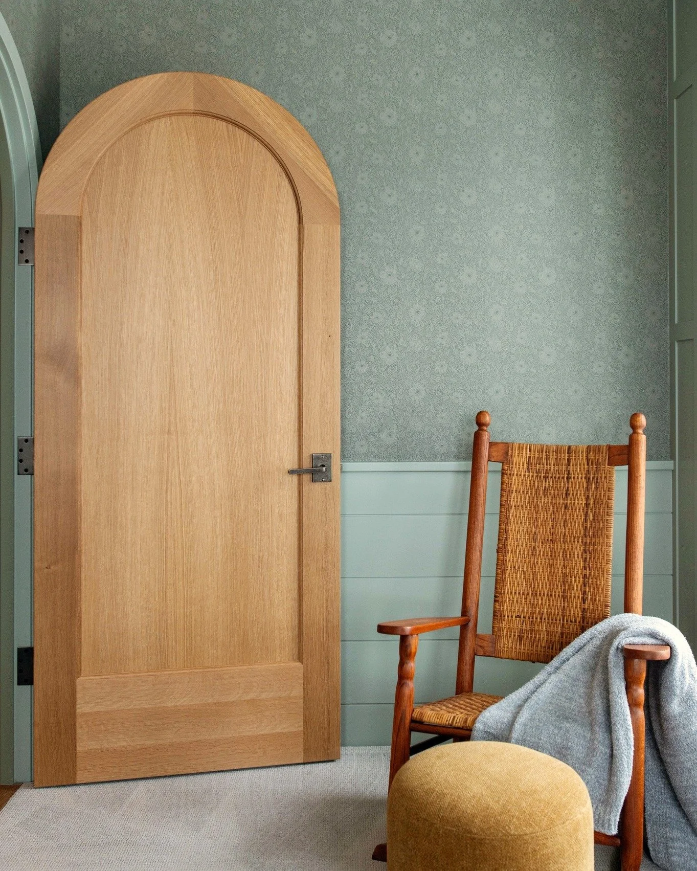 Some details are meant to stand the test of time. 

This custom arched wood door, handcrafted by Benchmark Wood Studio, brings warmth, character, and timeless craftsmanship to every corner. Paired with cozy moments and thoughtful design, it&rsquo;s t