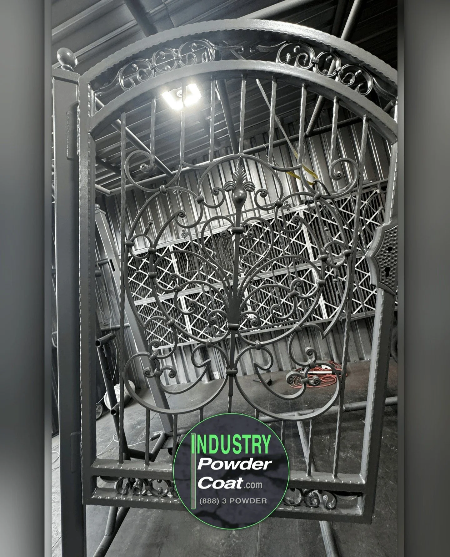 Custom iron gates powder-coated by Industry Powder Coat, primed with a zinc-rich base for rust protection. Industry Powder Coating services available at Paradise Fence Supply. Visit IndustryPowderCoat.com and ParadiseFenceSupply.com for more informat