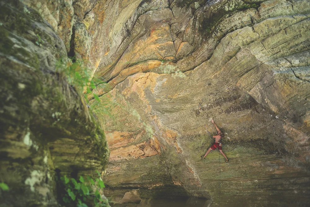 Zak rock climbing in James Canyon