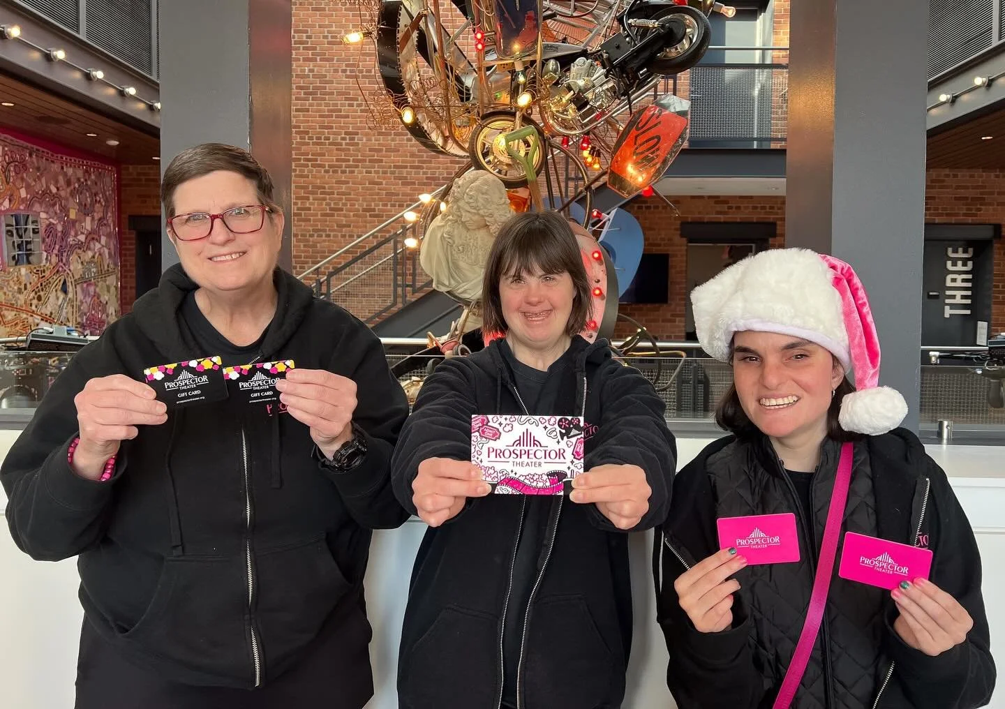 Still grabbing last-minute gifts? Stop by Box Office for gift cards, and Prospect-made bow cards and ornaments. Happy holidays, everyone! ✨❄️🎉
.
.
.
.
Photo Captions: 
1) Diane, Julie, and Cece pose and smile with Prospector gift cards. 
2) A Prospe