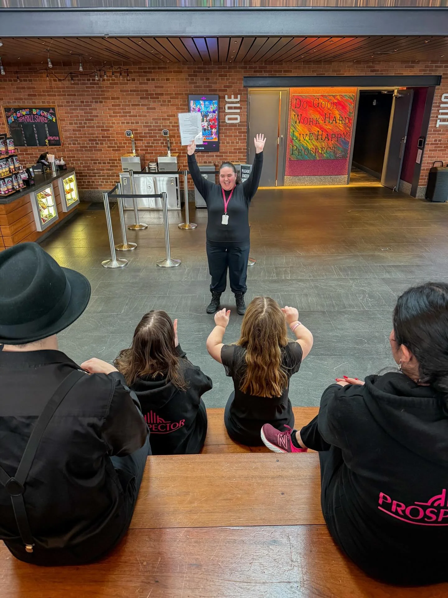 Our team is always practicing pink glove service! Ushers are working together to ensure your next movie going experience is spectacular! ✨🙌
.
.
.
.
.
Photo Caption: Emma stands in front of fellow Prospects during Usher University at The Prospector. 