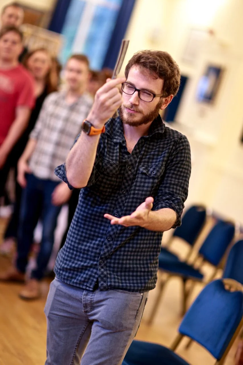 Neil in rehearsal with the cast (Photo courtesy of FRONT OF HOUSE PHOTOGRAPHY )