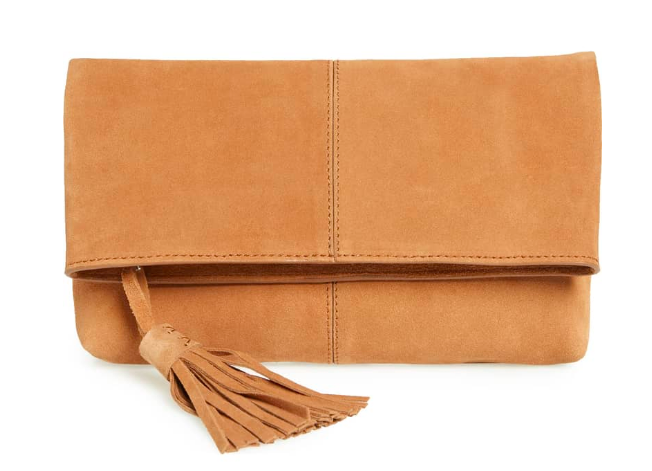 This suede clutch is perfect for more casual events! It comes in 5 different colors.