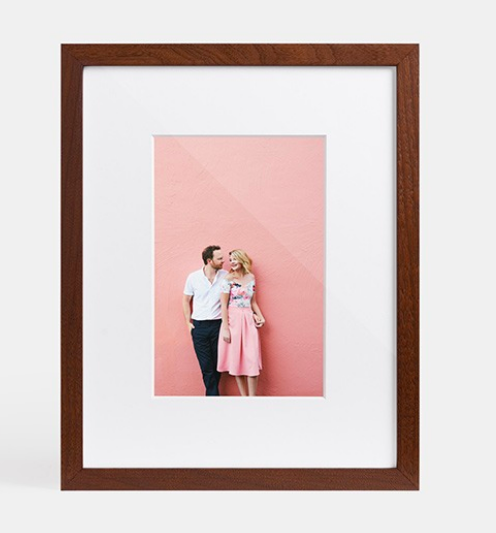Since wedding season is so busy for many brides, they forget to print their engagement pictures! Gift them a framed picture for their home.