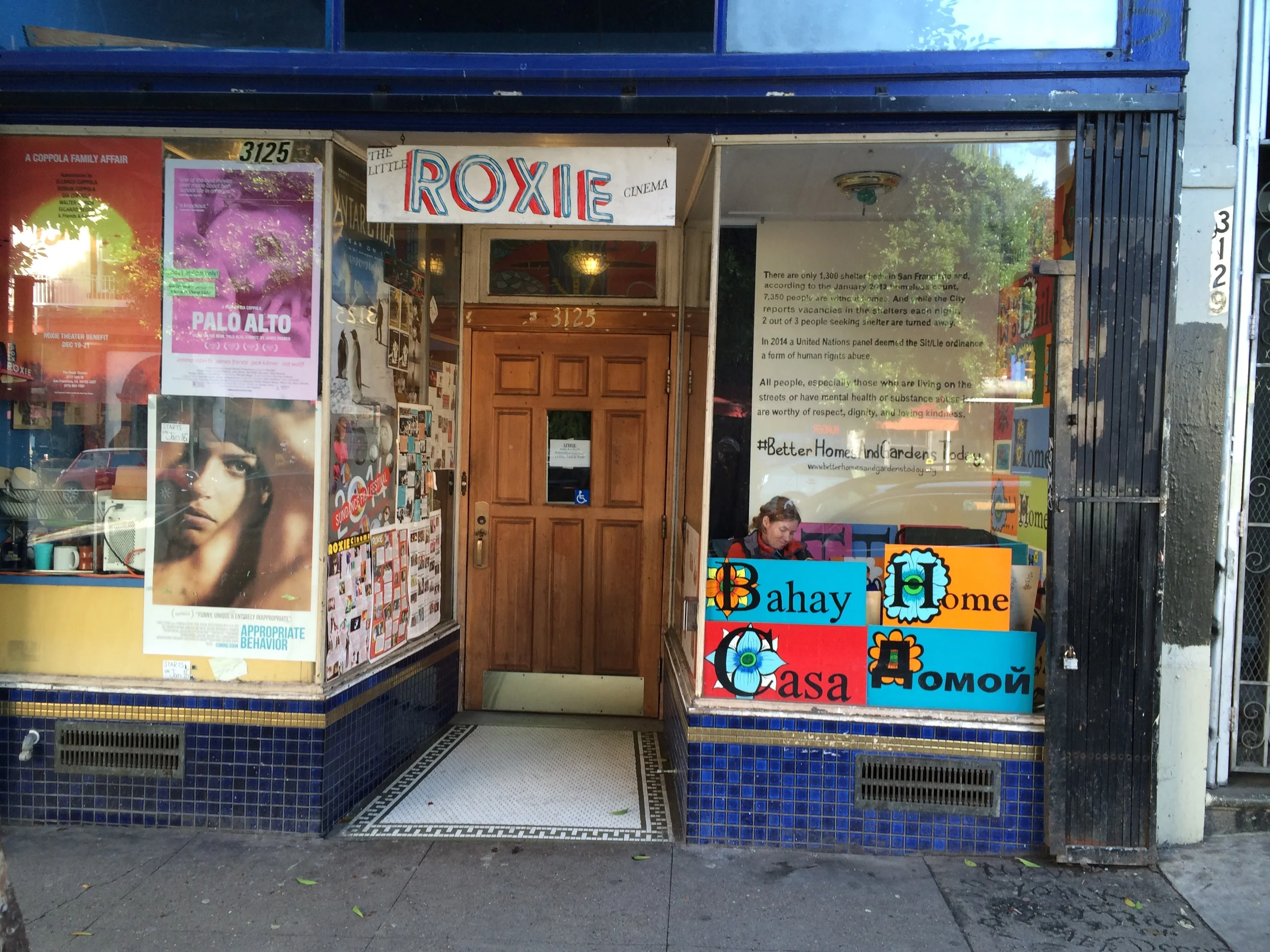 at home in the 'Little Roxie' window.