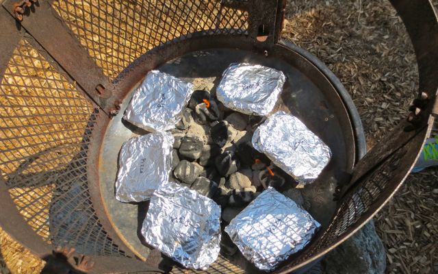 The mountain pies cooking directly on the coals. Mountain pies are basically stuffed sandwiches. There is a cast iron gadget available to hold these directly in the flames of the campfire. We were making so many, that we squished the edges of the bread and wrapped them in foil. The smell of the cooking food adds to the experience, rather than simply relying on the flames to fascinate.