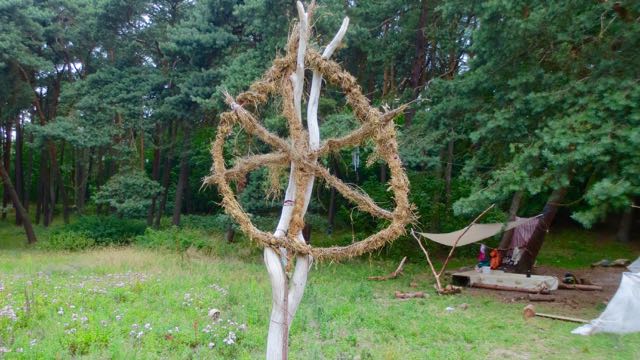 A wreath at Miško darželis signals to all that here is the clearing, here is the forest, you belong here.
