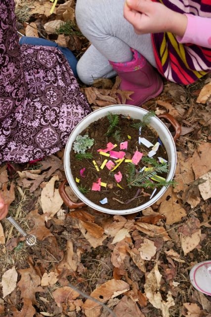 Lichen, pine needles, the freshest dirt, and scraps of painted paper are all ingredients for cake.