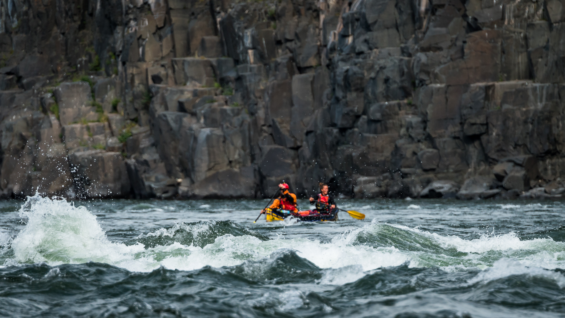 The Coppermine River rapids are not for the faint hearted, geologists navigate them by canoe, fully loaded with gear (Credit: Vivien Cumming)