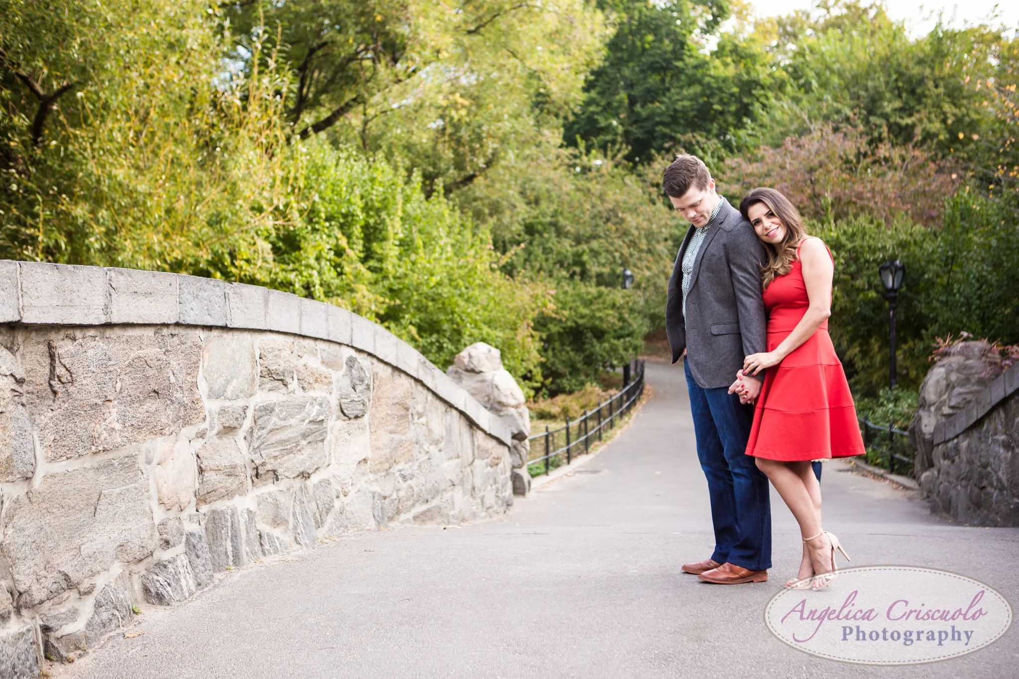 NYC Gapstow Bridge Engagement Photos Central Park Home Alone Red Dress