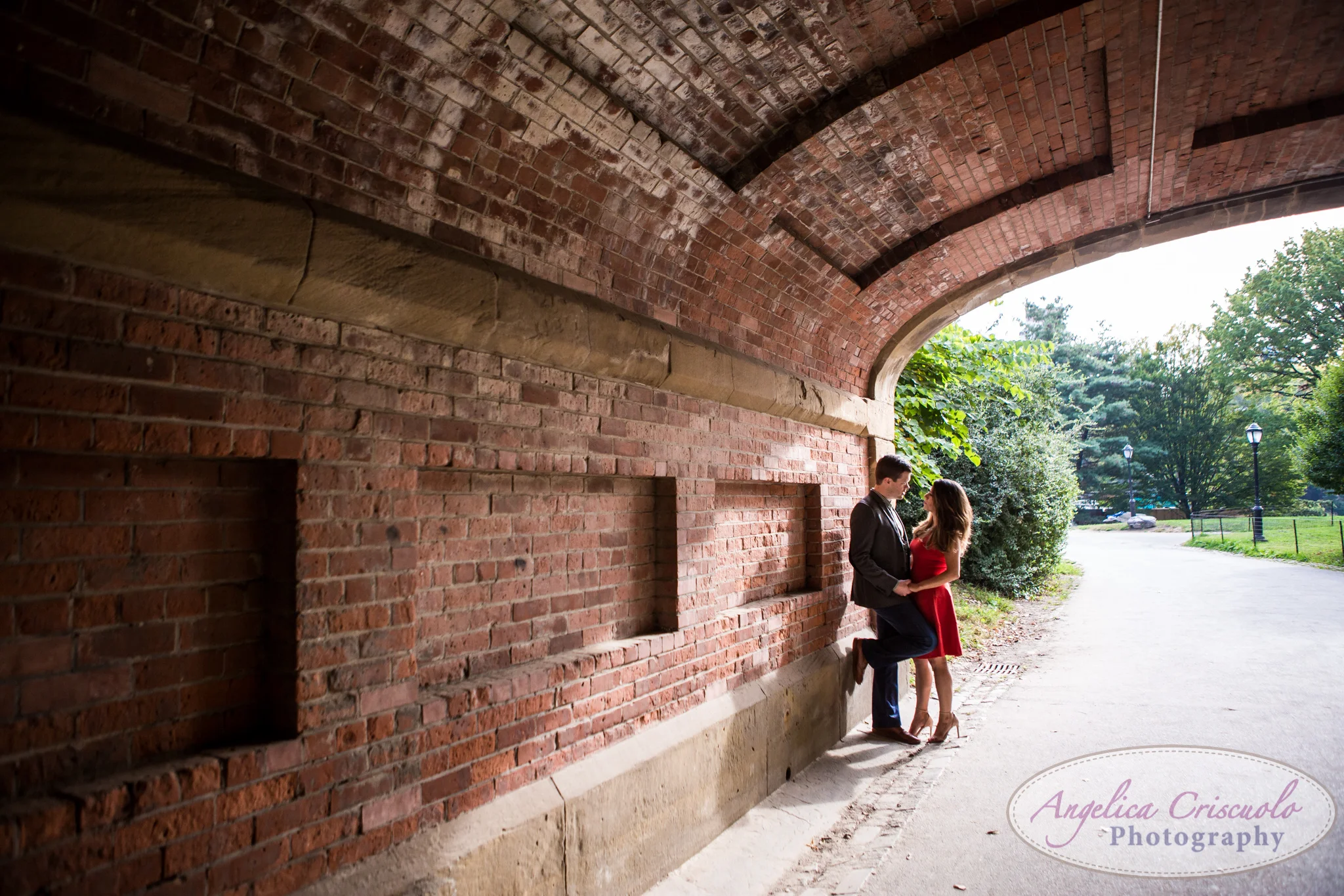 New York Central Park Engagement photo ideas tunnel red dress
