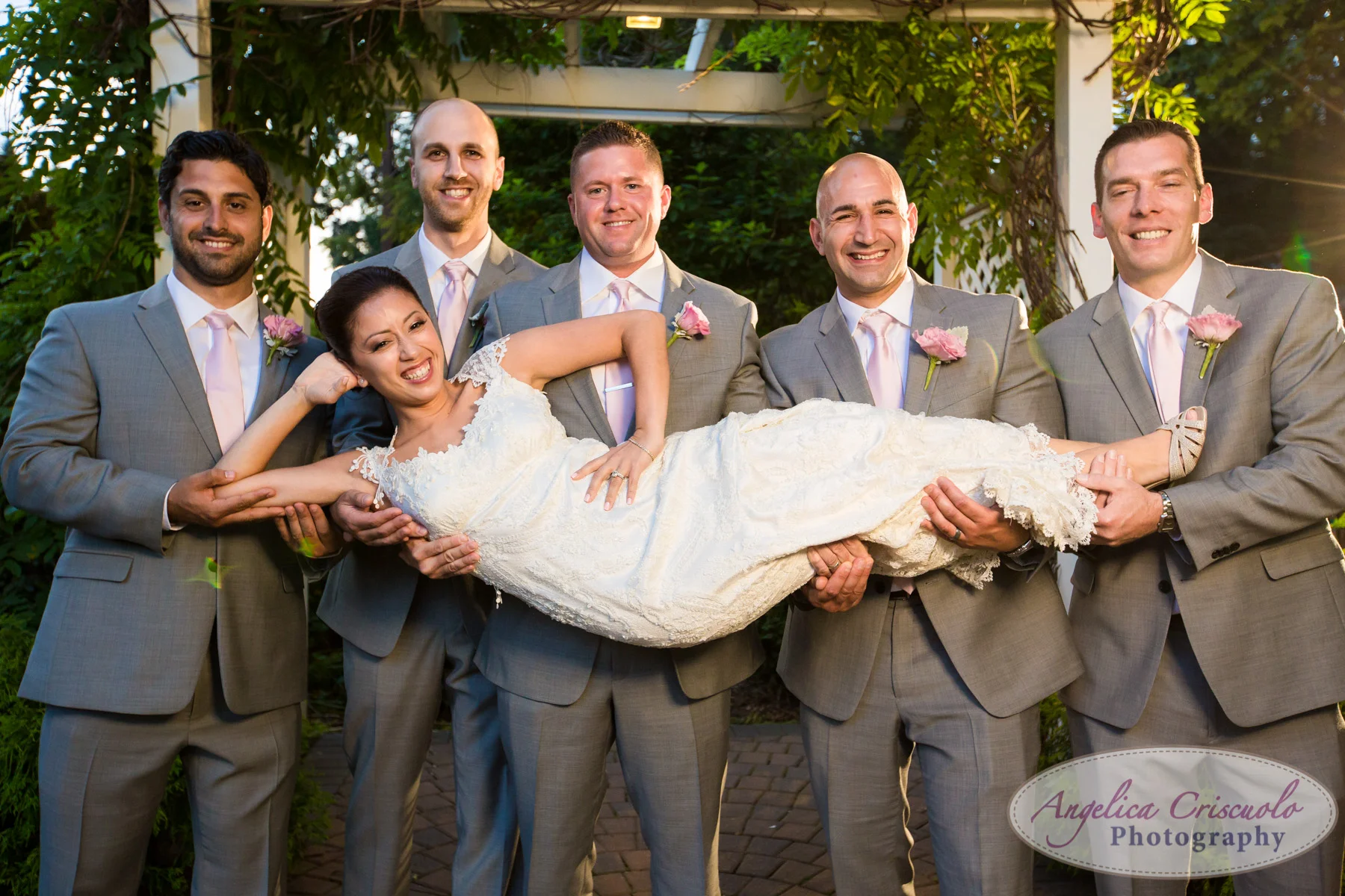 Bride and groom wedding photo ideas New York Bride being carried