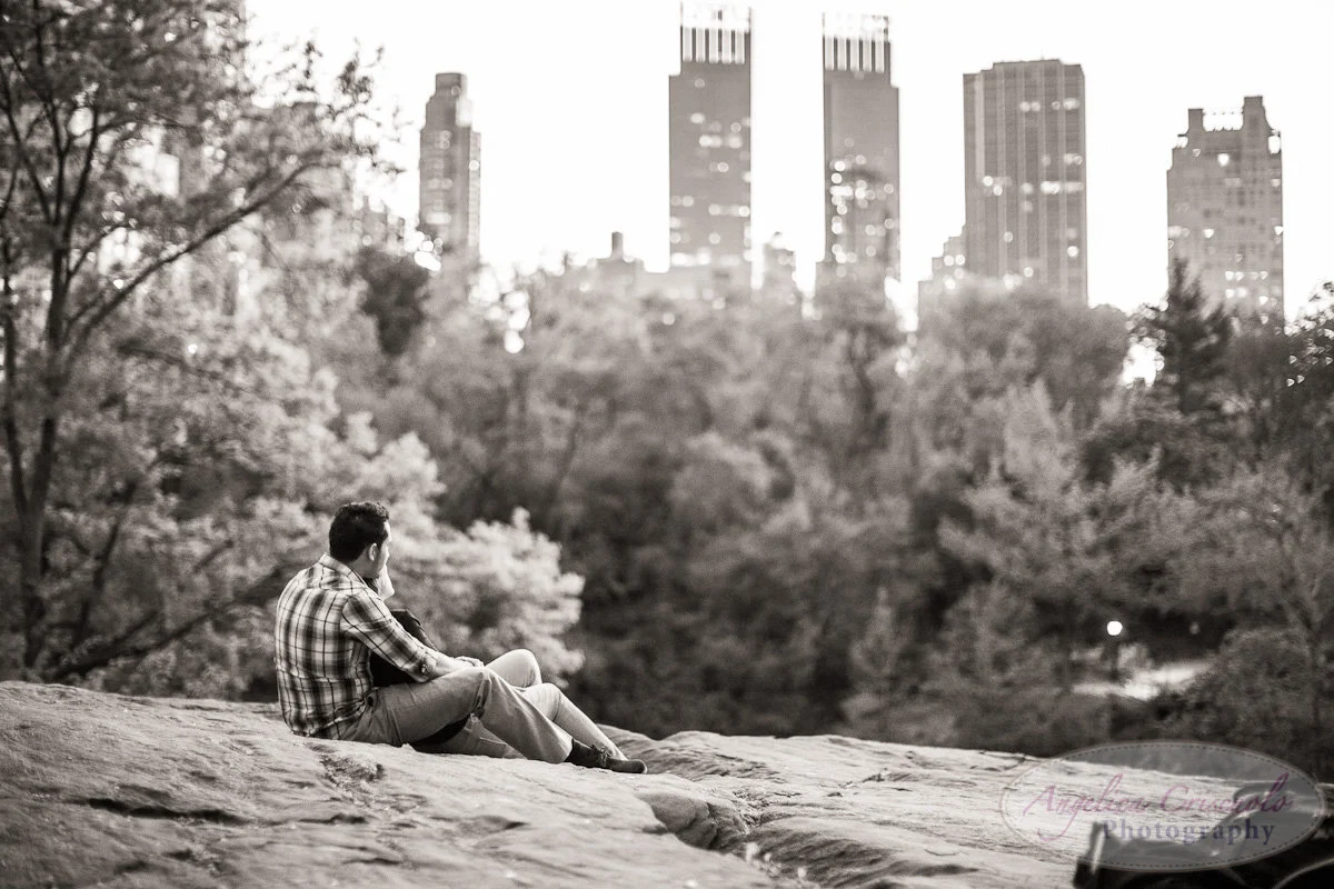 New York Engagement Photography Central Park skyline rock