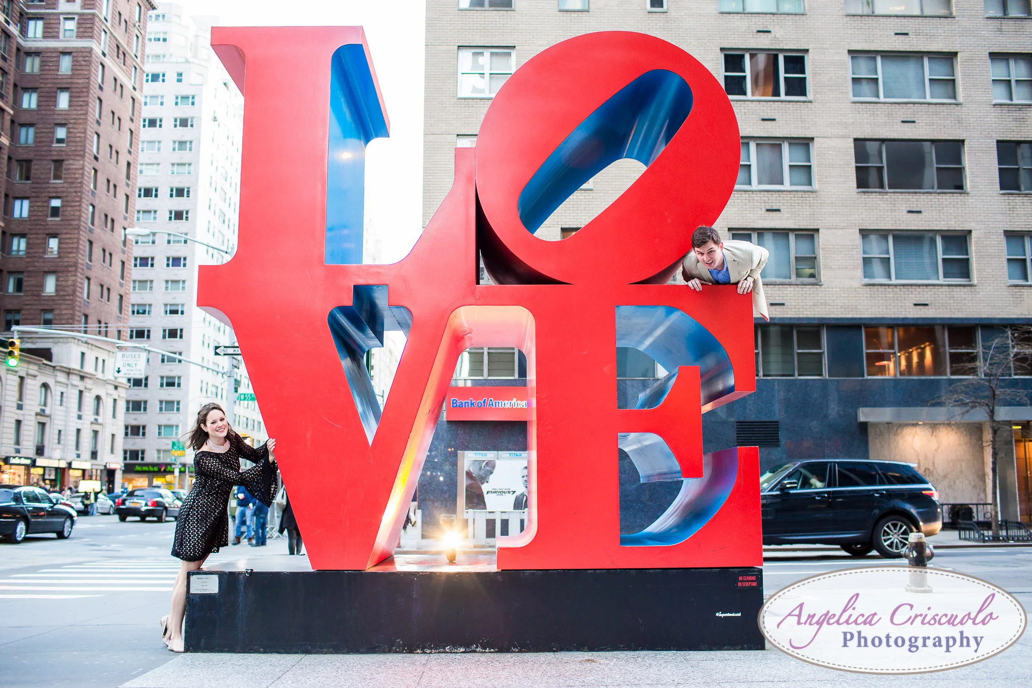 New York DC Wedding Engagement photos ideas by the LOVE sign on Avenue of the Americas