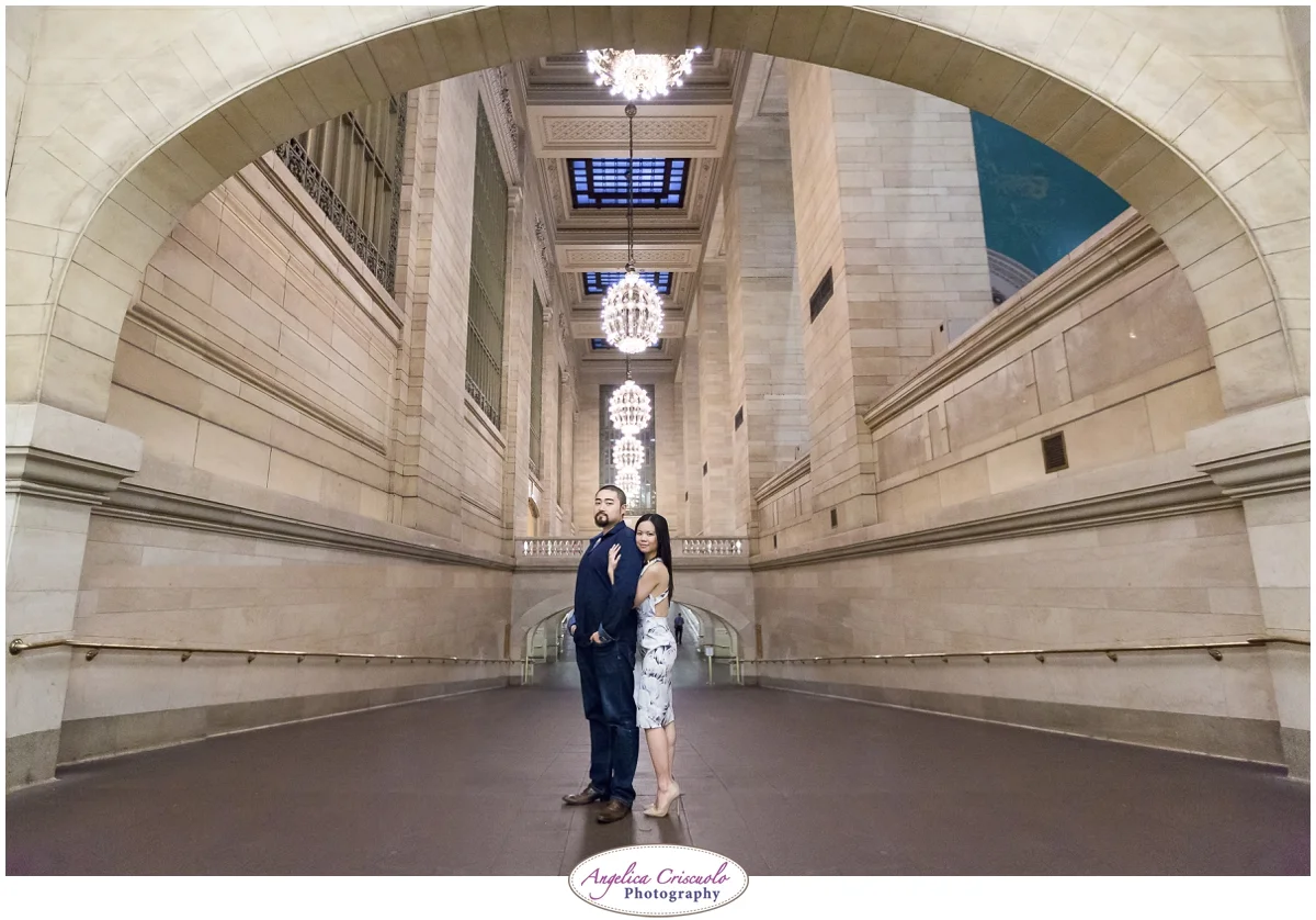 Grand Central Engagement Photographer photo ideas posing in tunnel near whispering