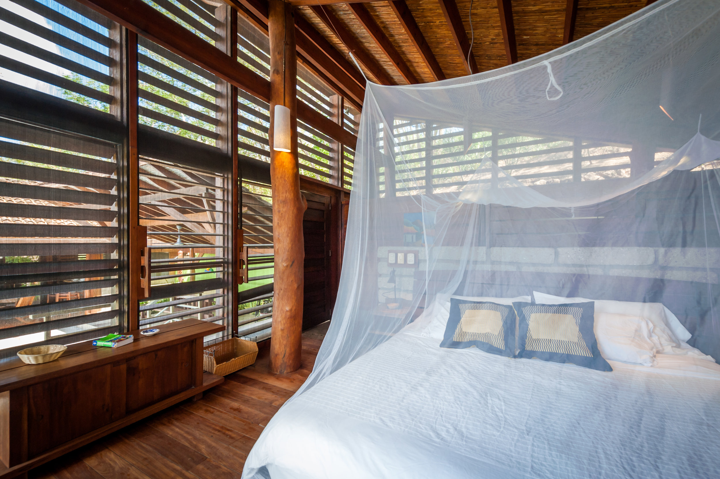 King sized bed with mosquito netting