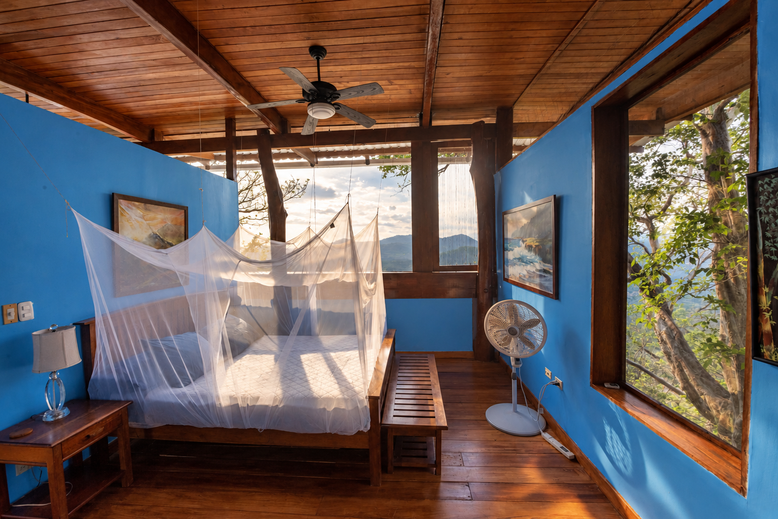 Sunlit Tropical Cabin Bedroom with Mountain Views.png