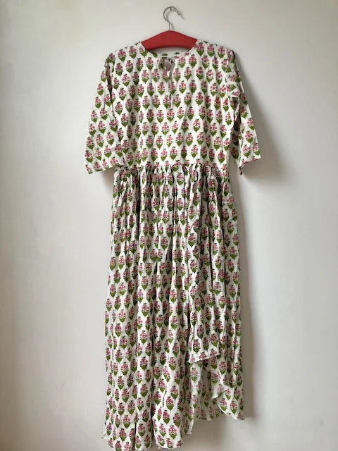 Hem cut out on the right side of the dress.