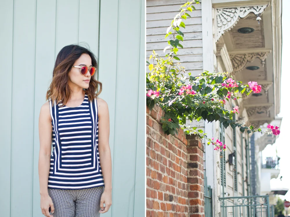 Oh, just me admiring all the beautiful colors of New Orleans... ( Top by Madewell, Pants by Joie, Sunglasses by LeSpecs .)