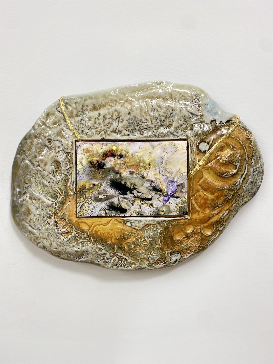  Soda-fired ceramic frame with gold repair and inlaid water-damaged photograph on anodized aluminum. Approx 12” x 10”  