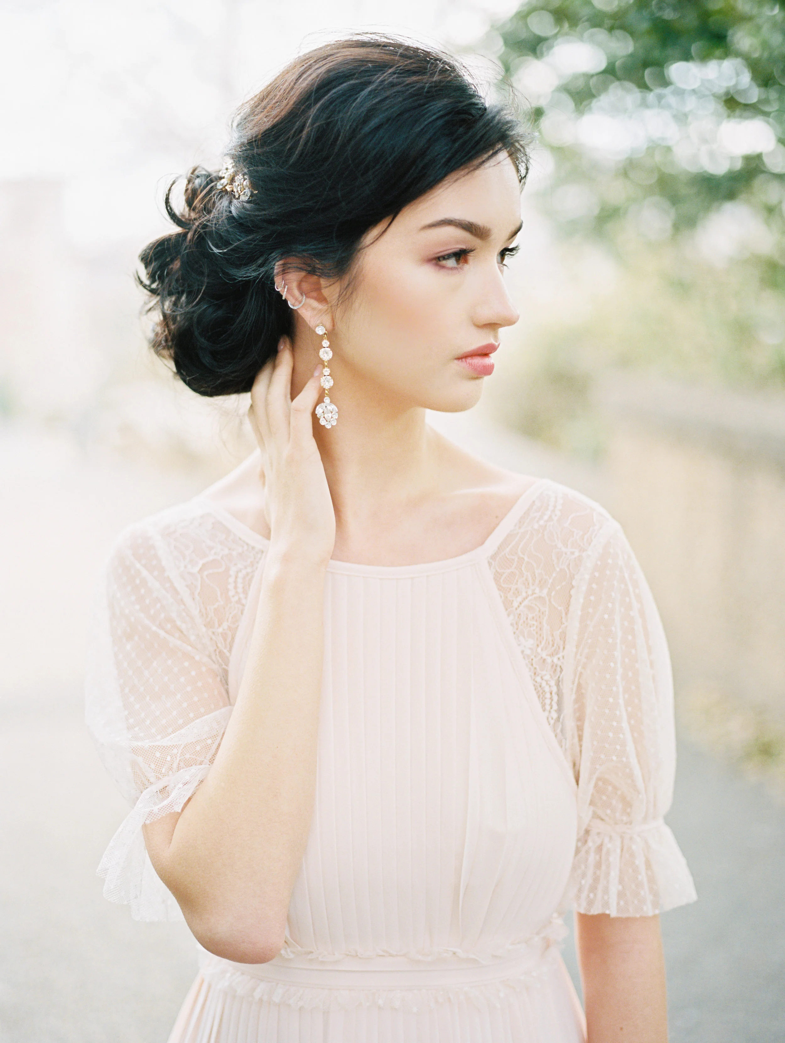 Model: Hannah Duff Photographer: Michelle Whitley ( http://www.michellewhitley.co ) Hairstylist: Anna Fazio Florist: Redman Florals Accessories: Lindsey Marie Designs Ring: Suzie Saltzman 