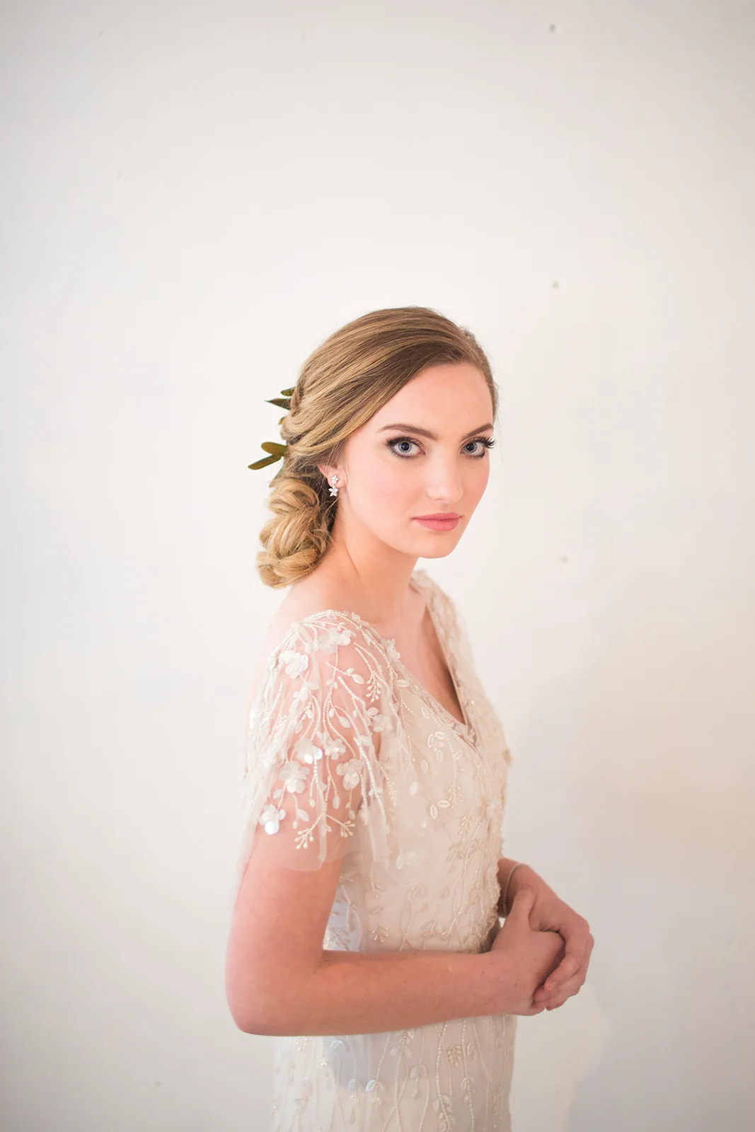  Model: Madeleine Koester  Photographer: Rebecca Wilcher  Hairstylist: Alexis Layne  Florist: Lark Floral  Gown: Marina Semone  Jewelry: Dominion Jewelers  Venue: 48 Fields  