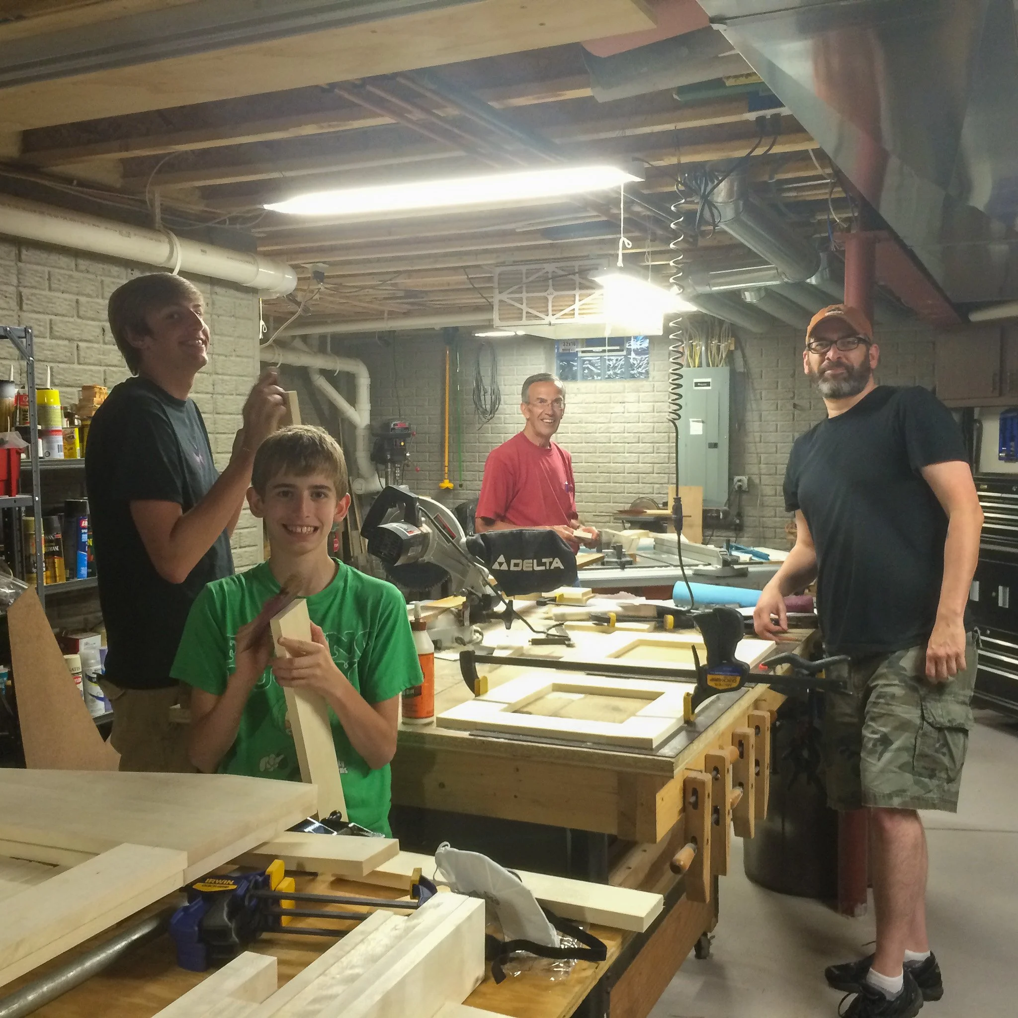 10-family-group-shot-mid-assembly-in-workshop.jpg