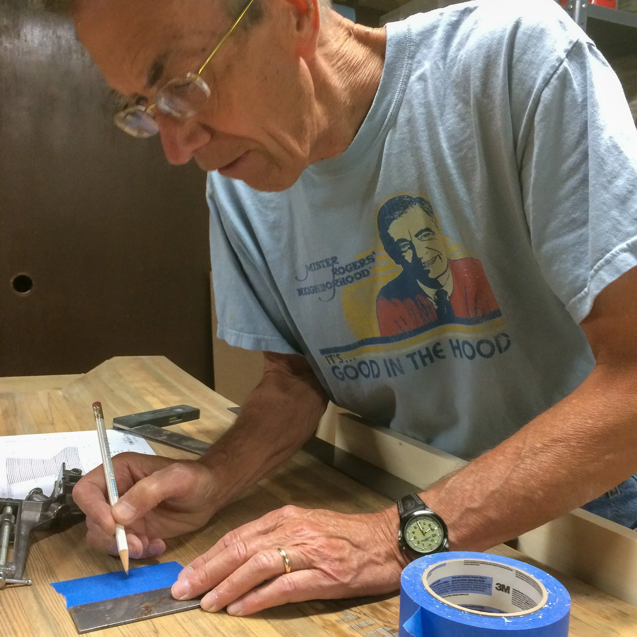 16-dad-marking-precision-pencil-lines-along-tape-edge.jpg