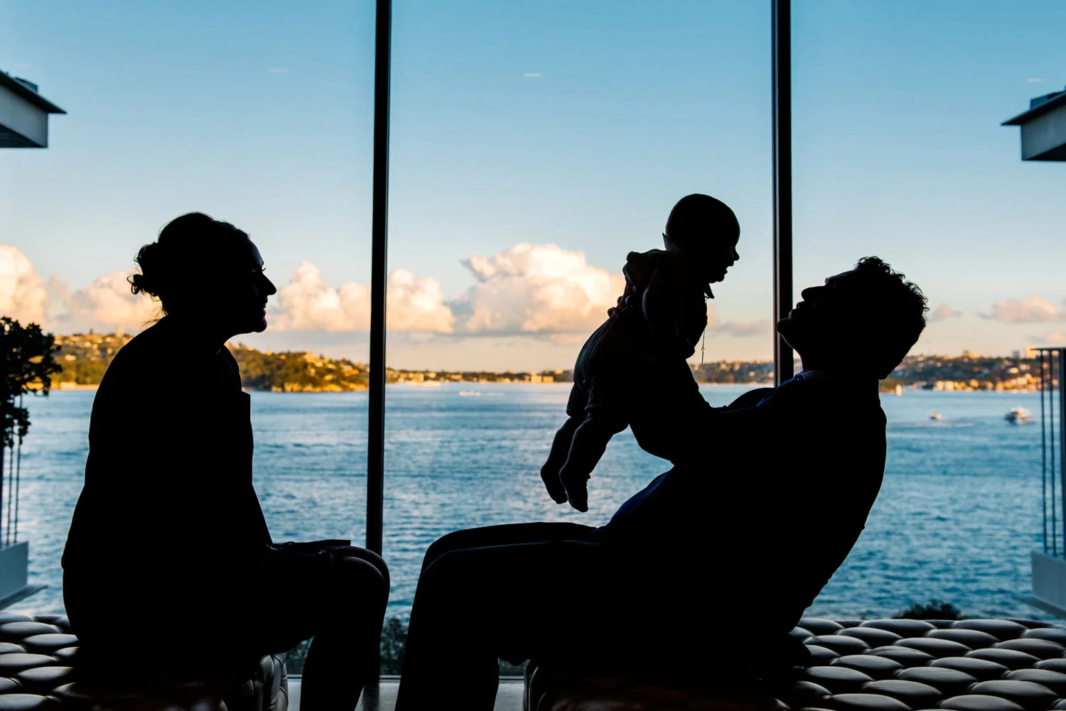 Silhouette of parents and baby - Christening reception, Sergeants Mess