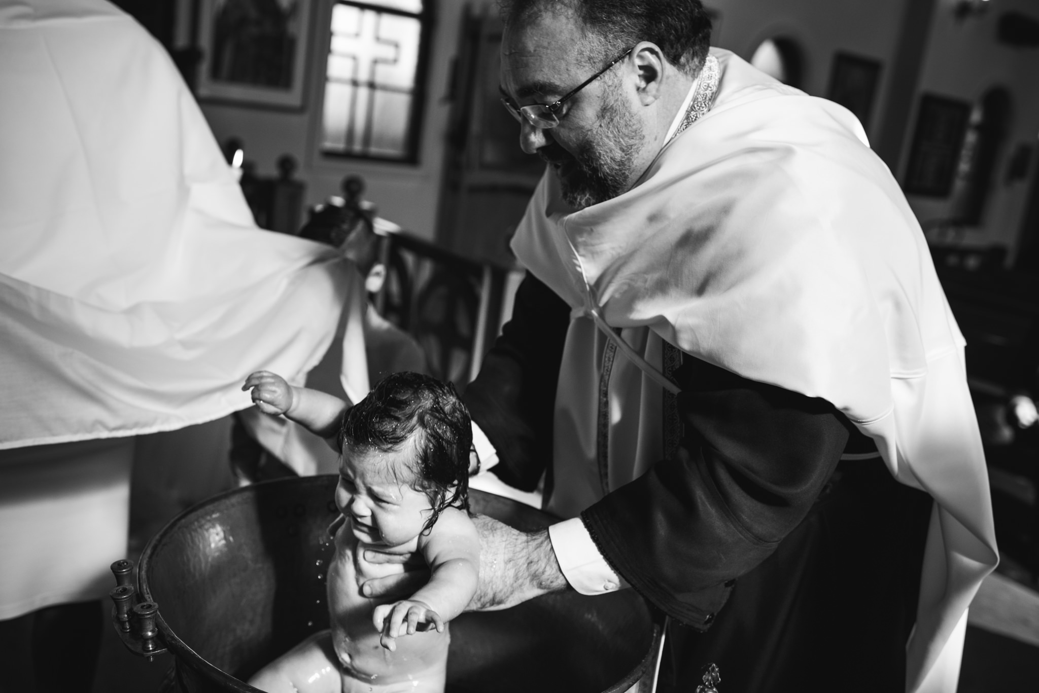 Baptismal font at Orthodox christening.jpg