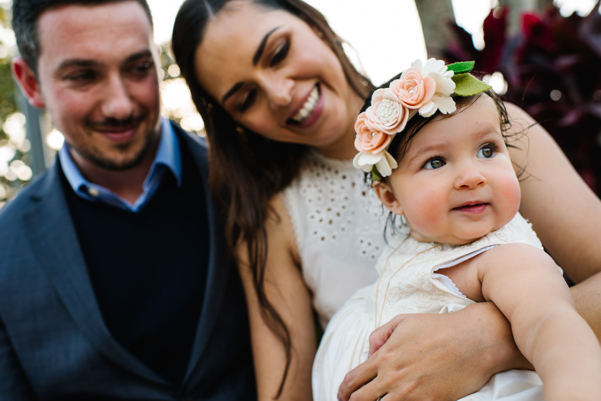 Outdoor family photo at christening reception