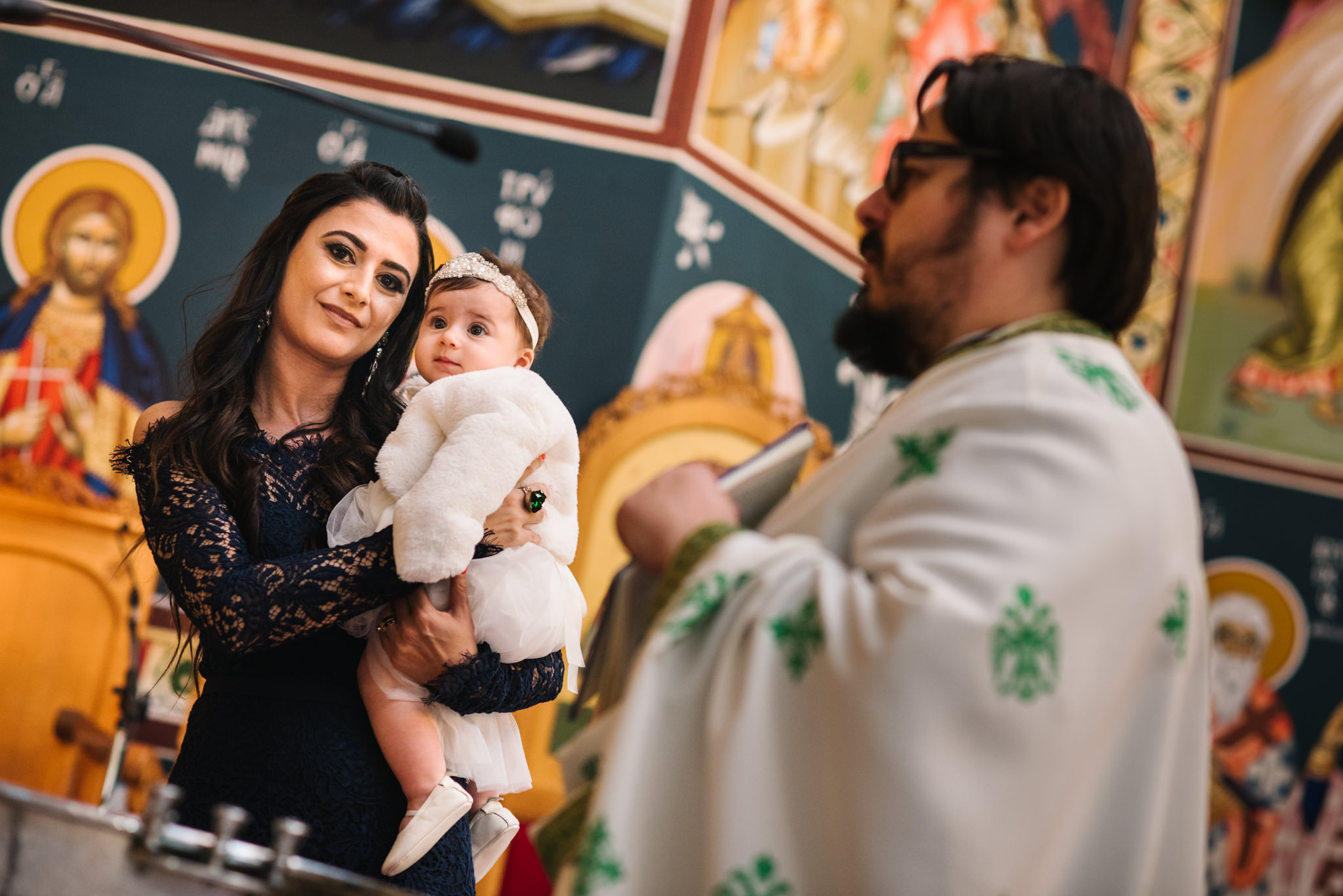 Godmother and baby Greek Orthodox christening