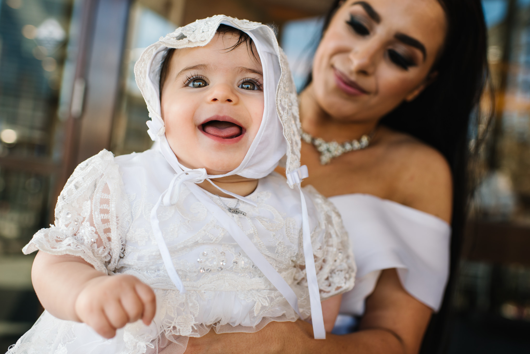 Baby and mother at christening reception