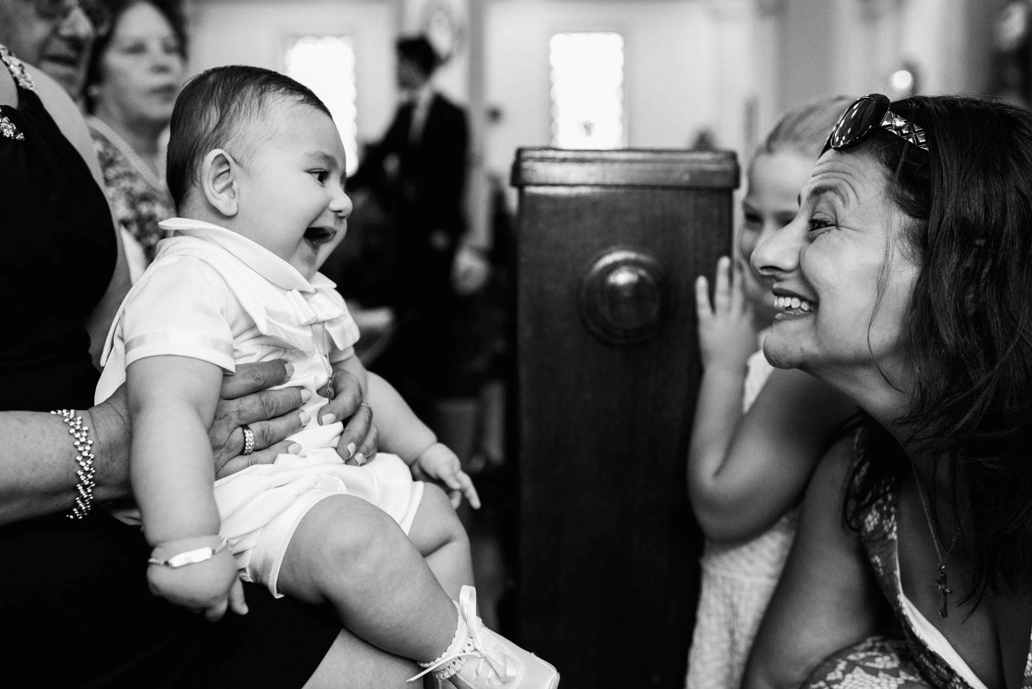 Happy baby at St. Joseph's Catholic church christening