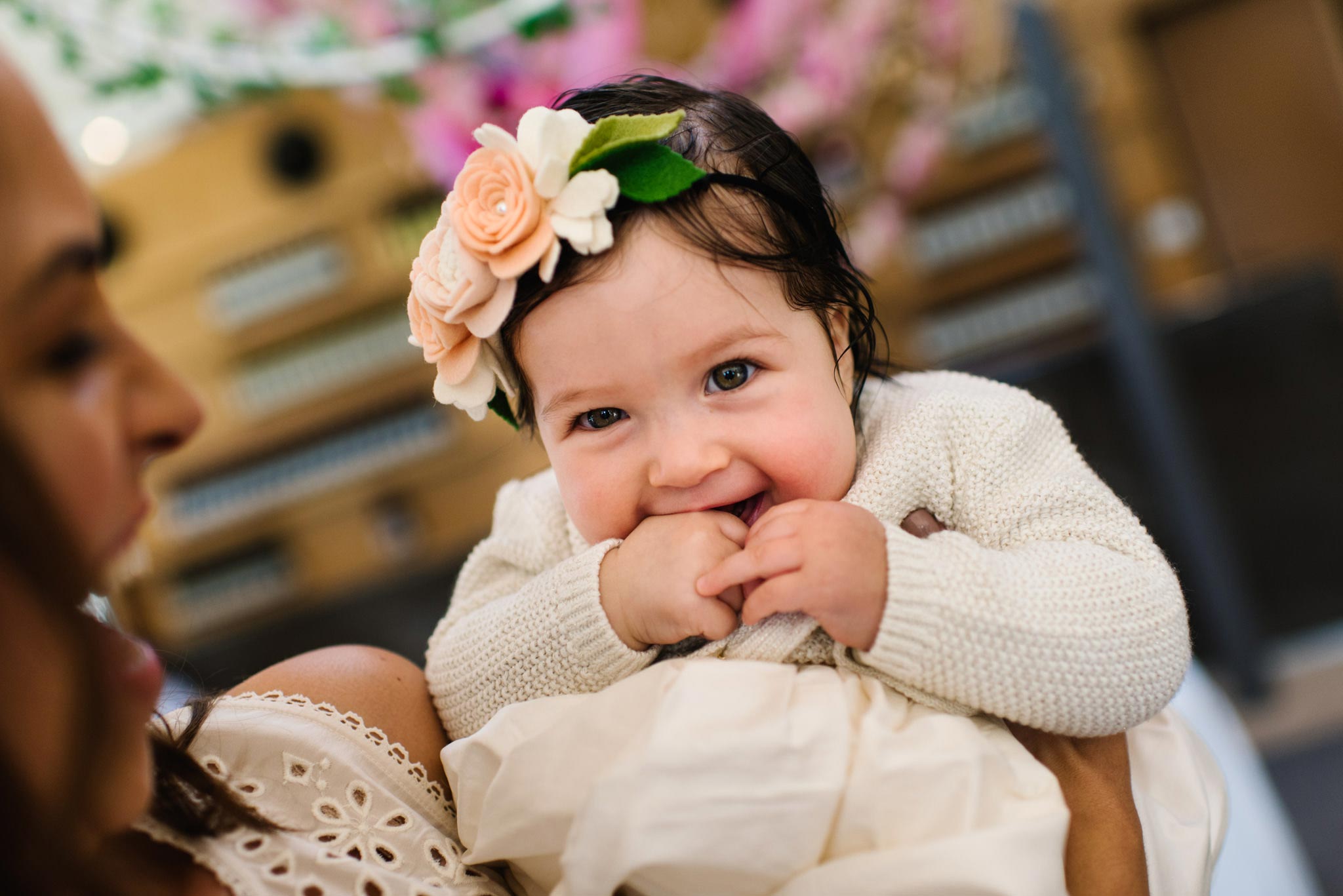 Baby smiling at Oliveto christening venue