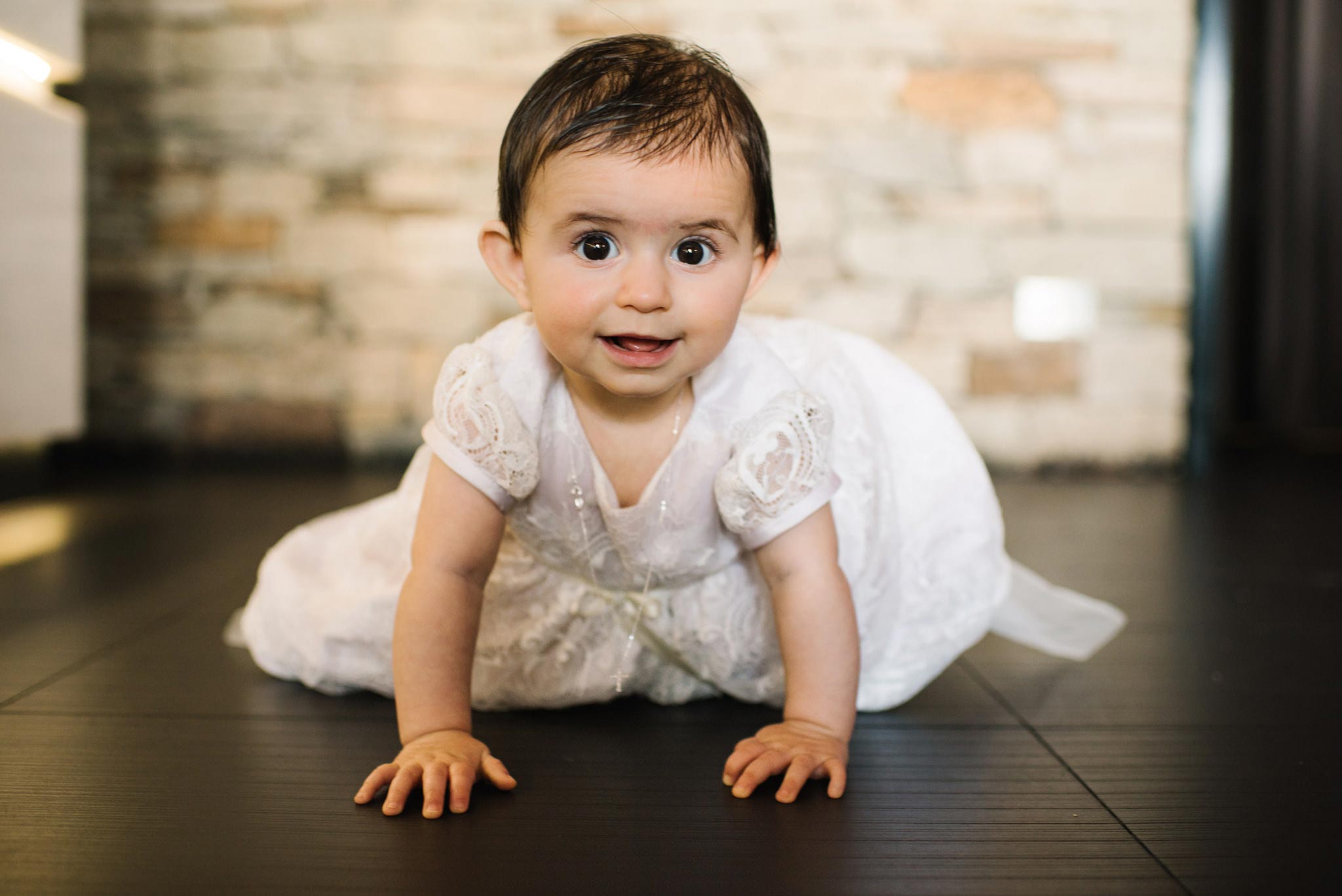 Baby girl enjoying christening party at Bianco Sydney