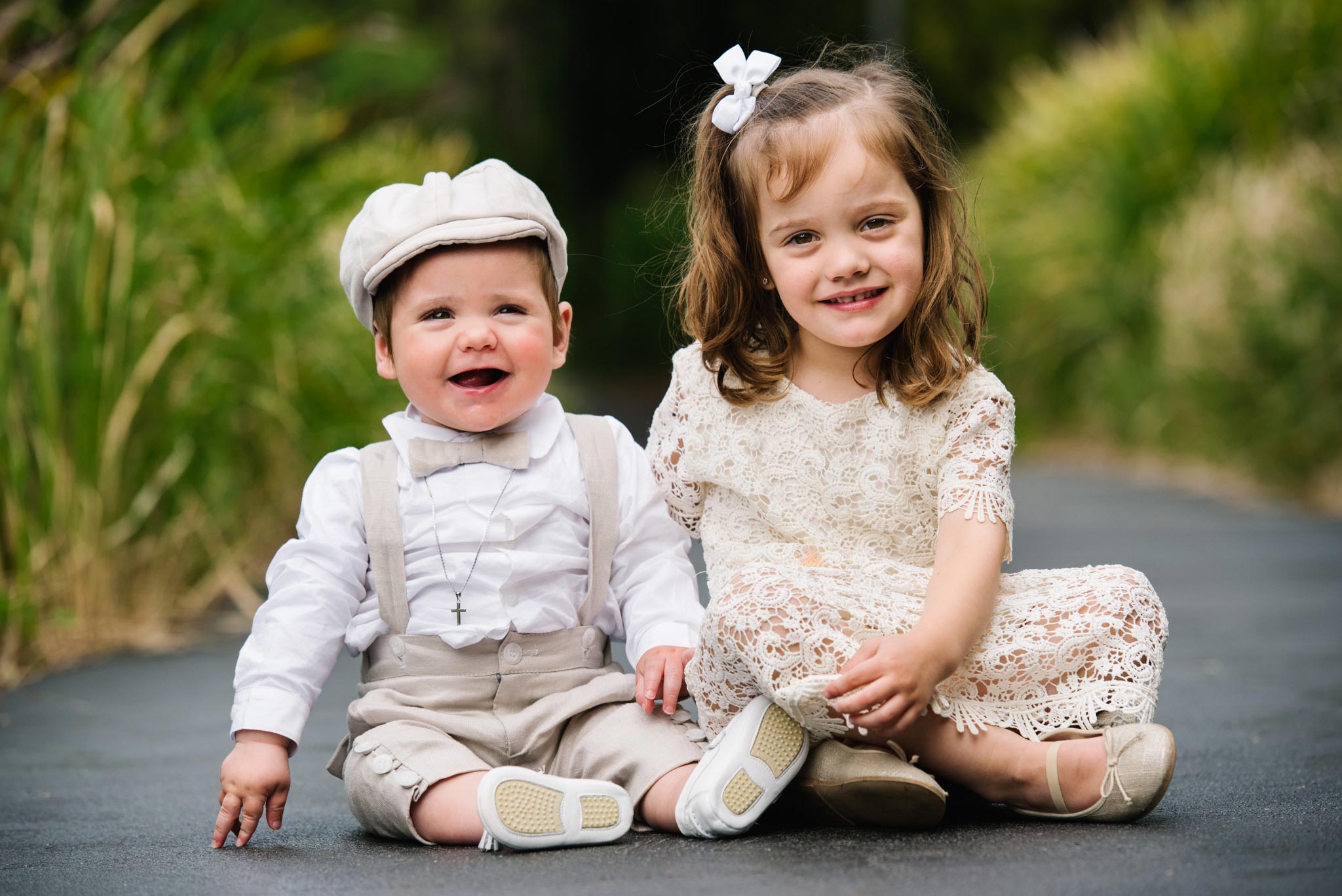 Cute brother and sister at christening venue Oliveto in Sydney
