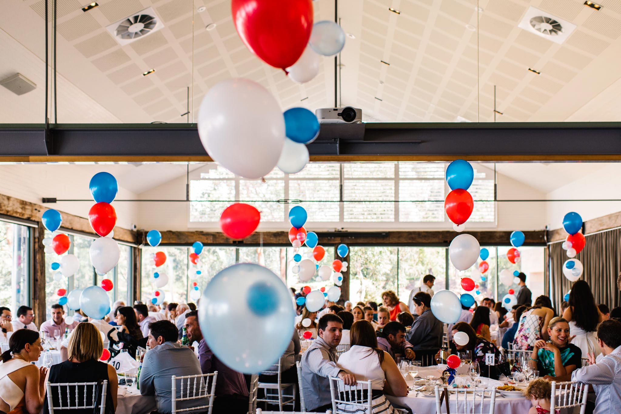 Blue, red and white helium balloons at Deckhouse christening