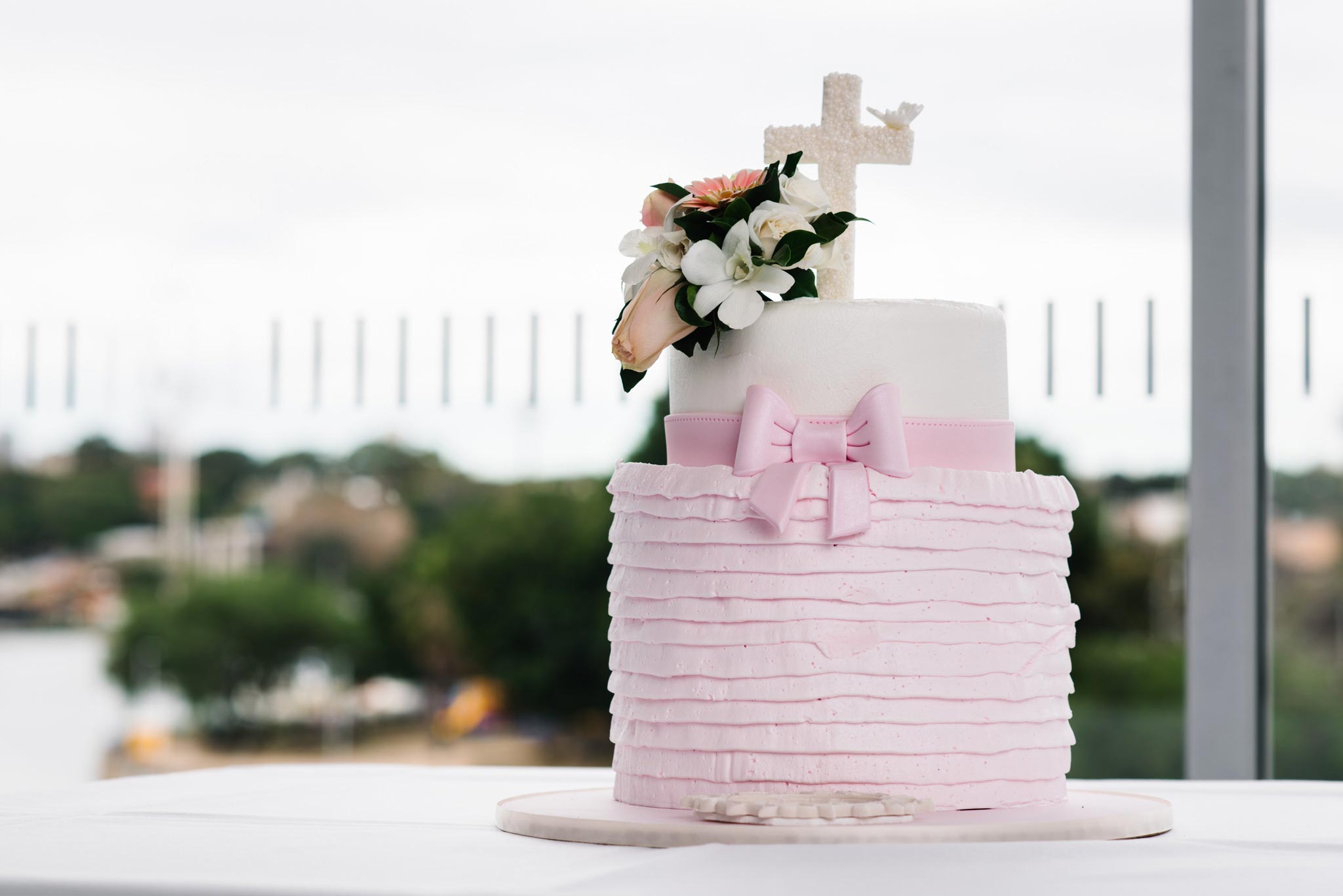 Pink frilly christening cake at Ecco Ristorante