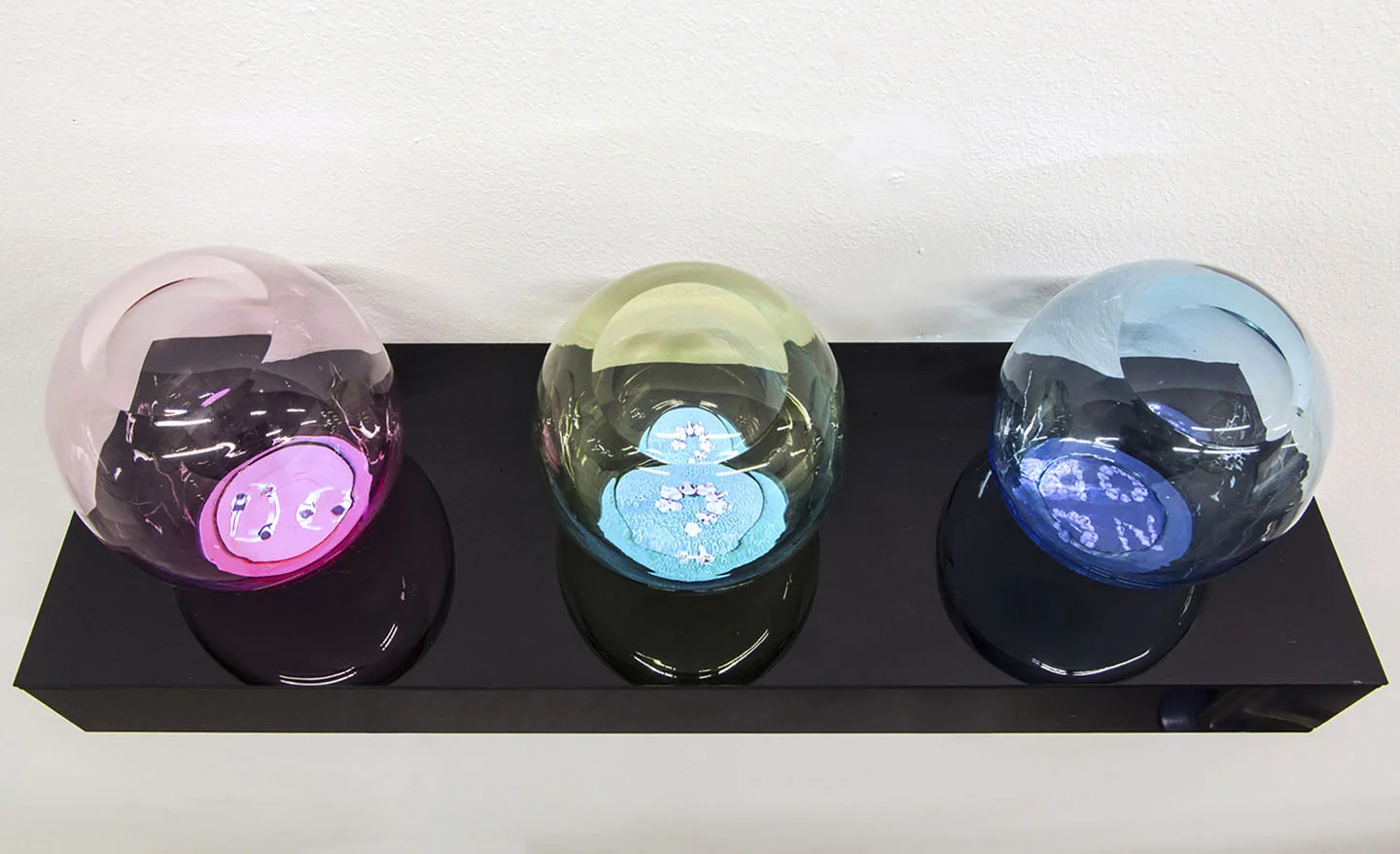 RGB Well 2010 3-Channel video composition, 3:40 min, looped 3 glass cups filled with liquid, video screens embedded in a black acrylic pedestal 19 x 9 x 9 in / 48 x 20 x 20 cm