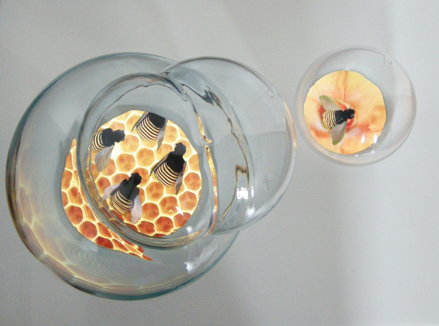 To Whom Does The Air Belong To? 2014 Two-channel video, 6:40 min, looped Hand-blown glass bubbles, video screen embedded in white acrylic 20 x 15 x 14 in / 51 x 38 x 35 cm